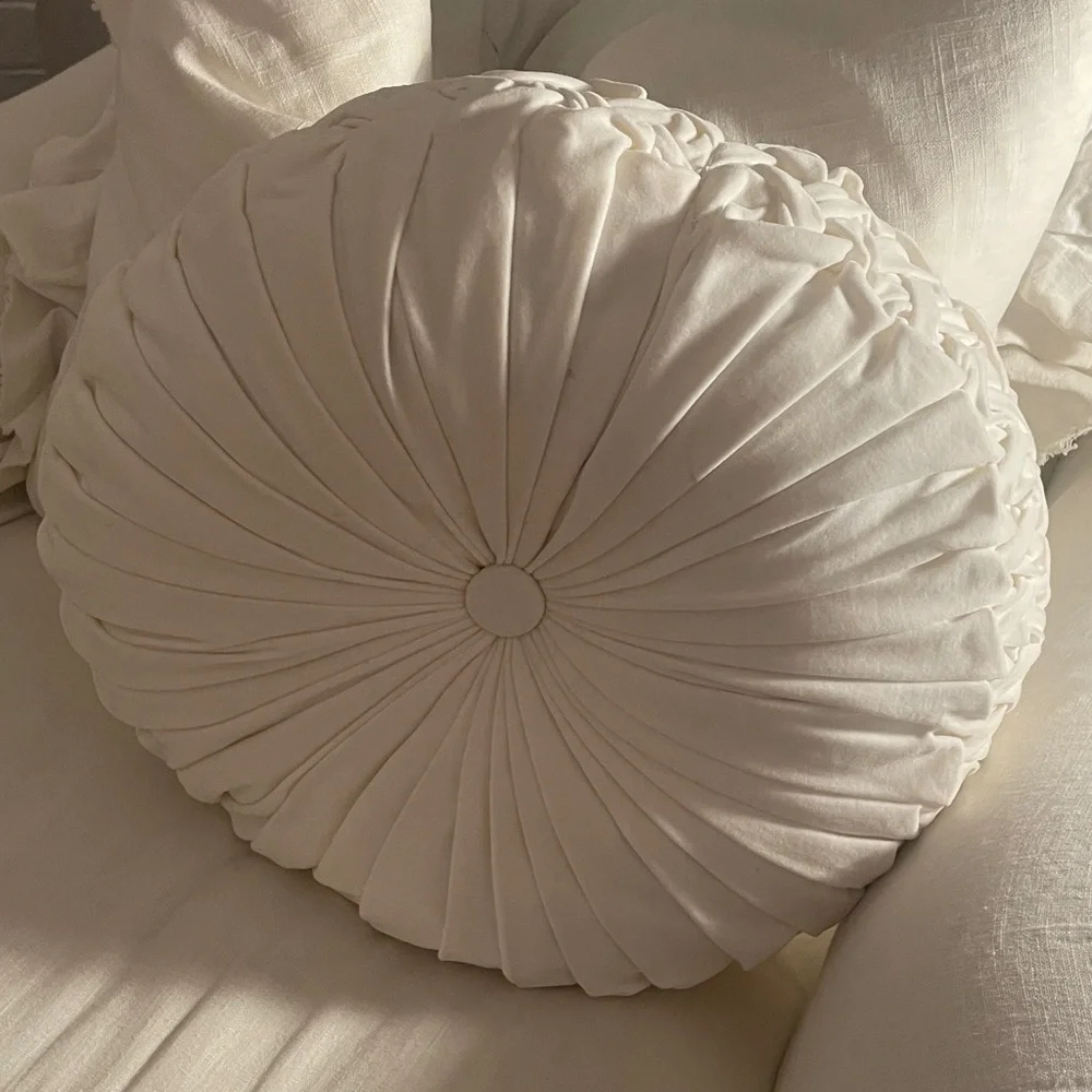 Round white velvet tufted pillow